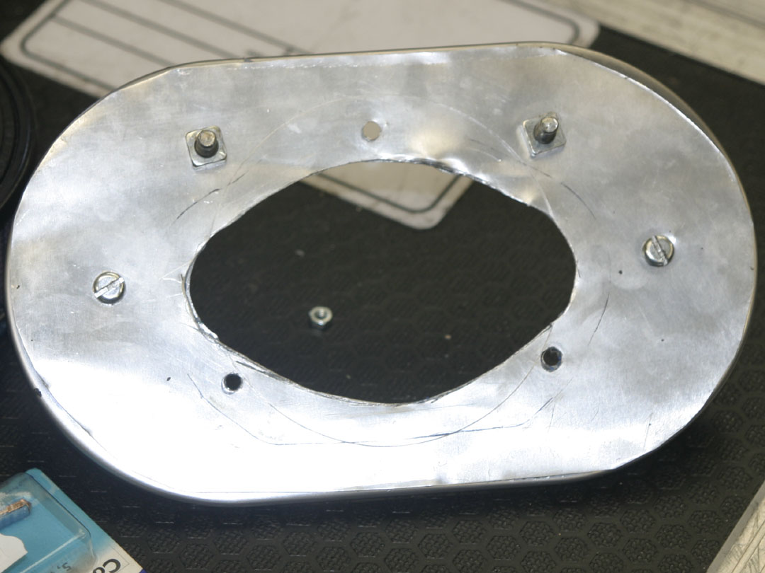 adapter plate fitted to base plate, note that later I found one of the long bolts sticking out was getting in the way of the choke leaver and had to be shortened