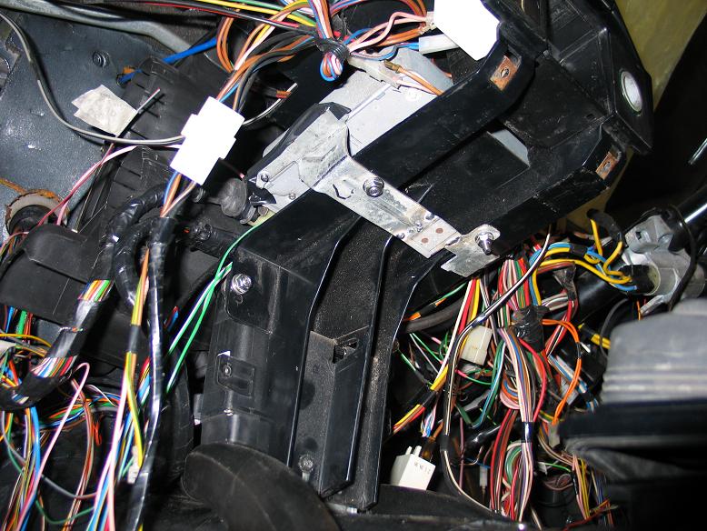 ECU mounting with modified 940 bracket. Needs V-short bolt and small nut.