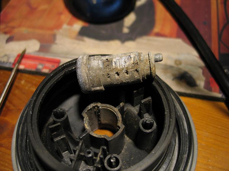 Offending lock barrel, needed tapped out with a screwdriver handle.